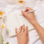 bride with open wedding vow book ready to write wedding vows